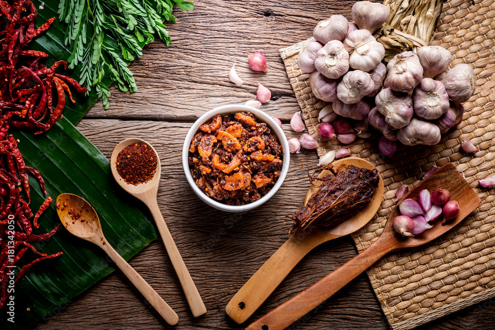 thai tradition style spicy dipping mad frop pork and shirmp with spicy and herb for ingredient on wo