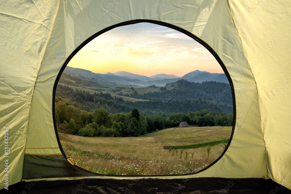 View from inside a tent on mountains landscape