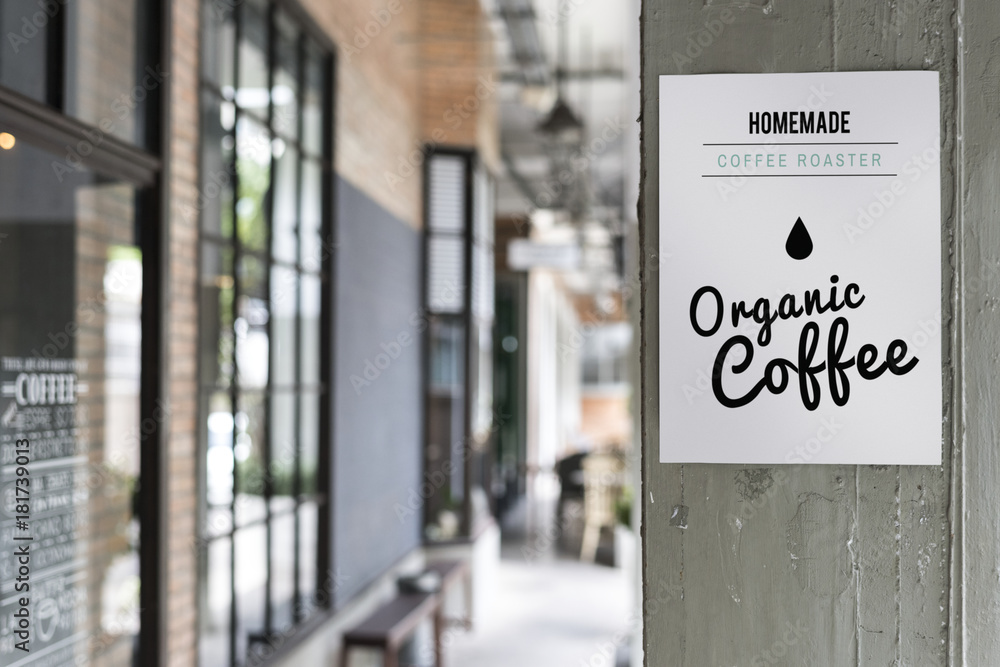 Organic coffee advertisement on a wall