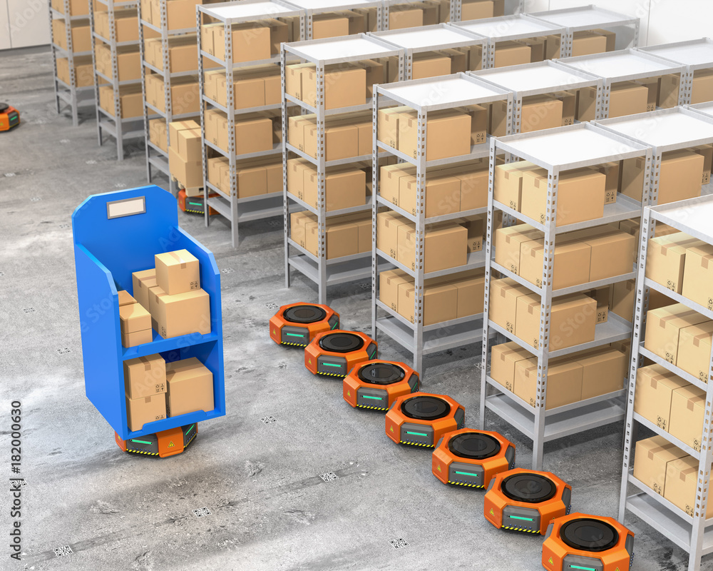 Orange robot carriers parking near to shelves in modern warehouse.  Modern delivery center concept. 