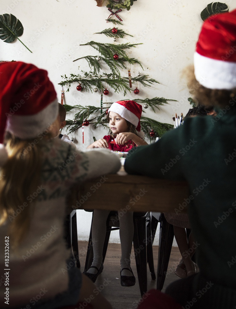 Pretty little girl wearing a santa hat