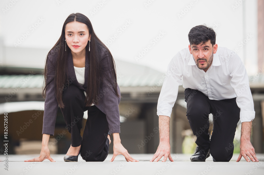 Young businessman and businesswoman sitting in starting point, ready to work, start up business, tea