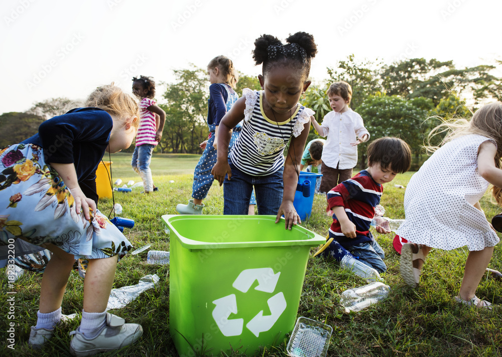 Responsible group of kids cleaning at the park