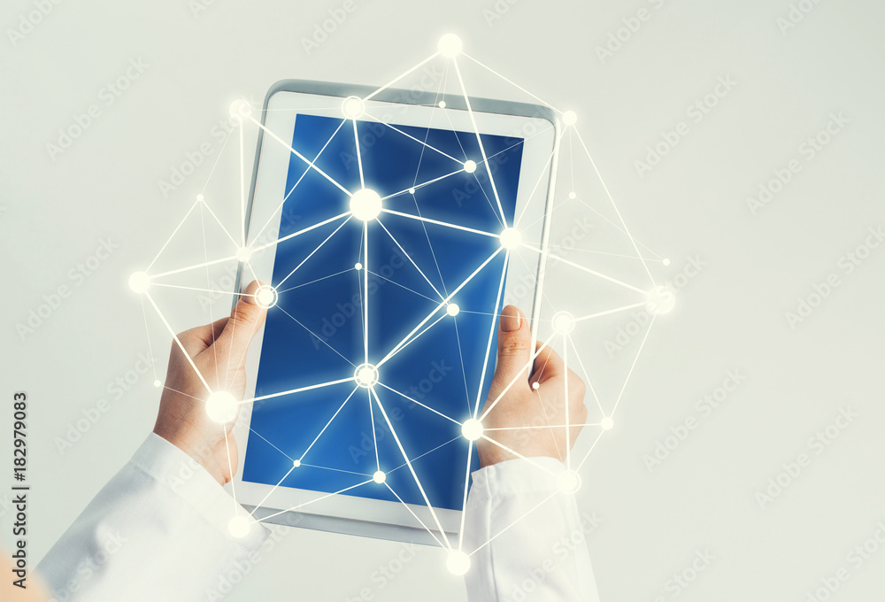 Close of female doctor hands working with tablet pc computer