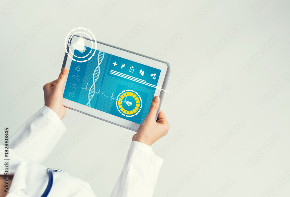 Close of female doctor hands working with tablet pc computer