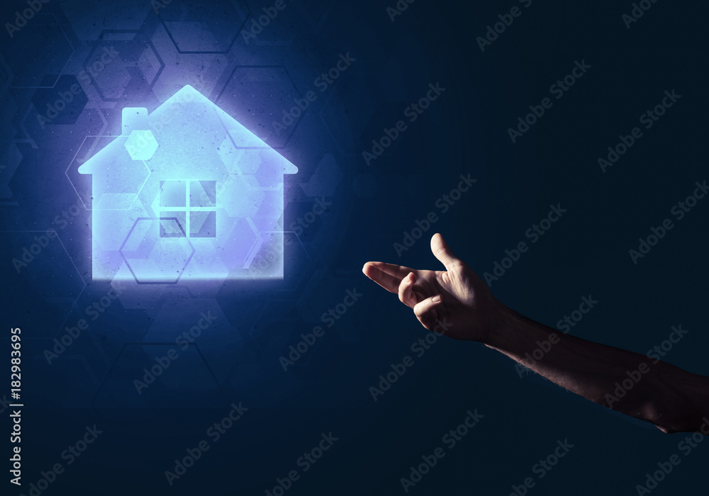 Conceptual image with hand pointing at house or main page icon o