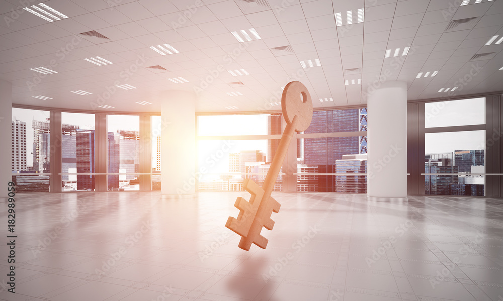 Conceptual background image of concrete key sign in modern office interior