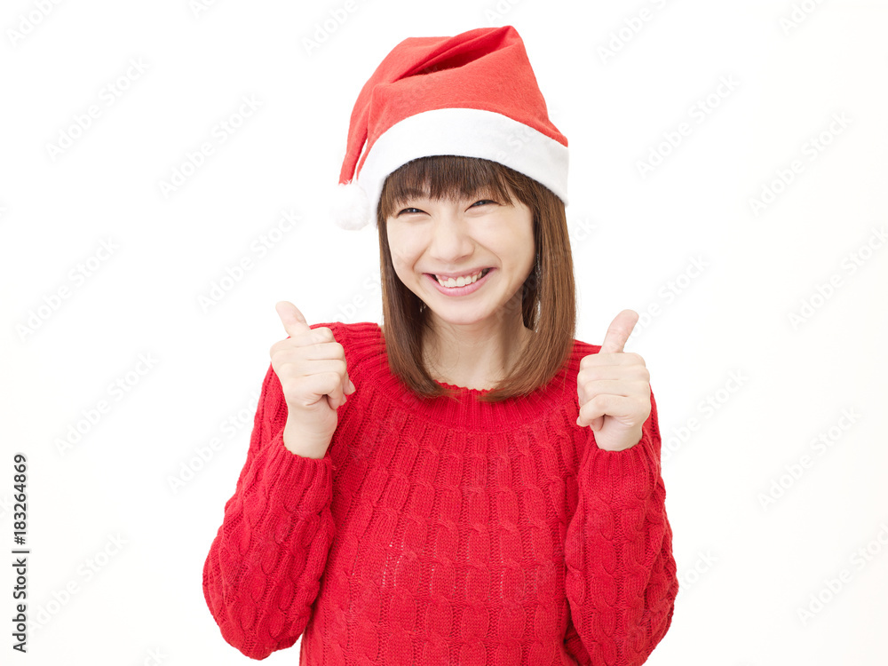 女性　クリスマス　グッドサイン