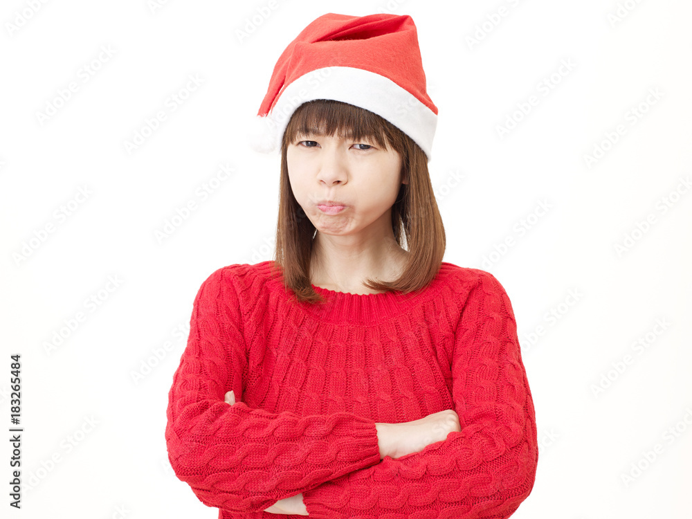 女性　クリスマス　怒る