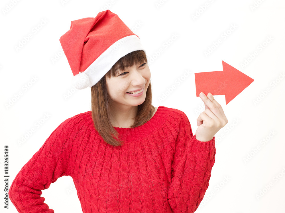 女性　クリスマス　矢印