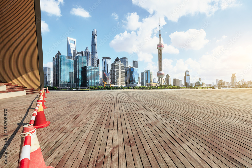 Empty city square floor and modern city commercial buildings scenery in Shanghai,China