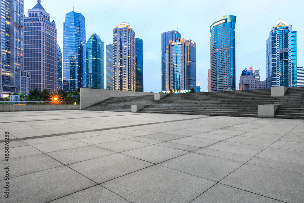 Shanghai city square and modern commercial building scenery at dusk,China