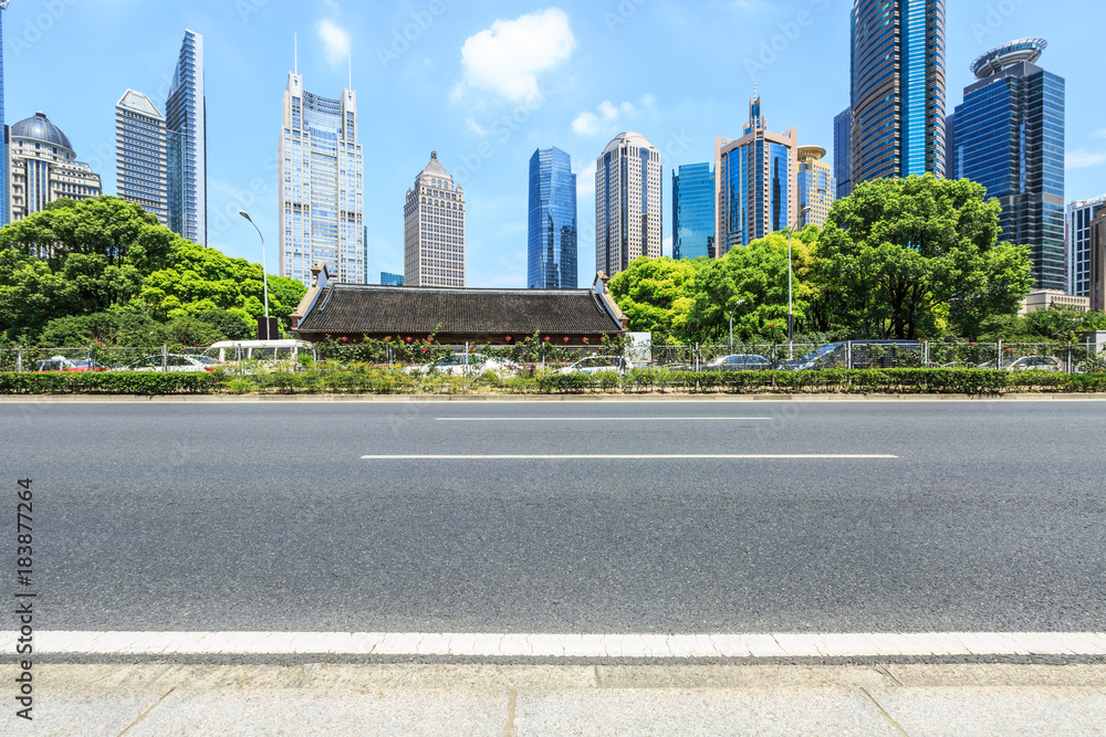 Shanghai urban road and modern commercial building scenery,China