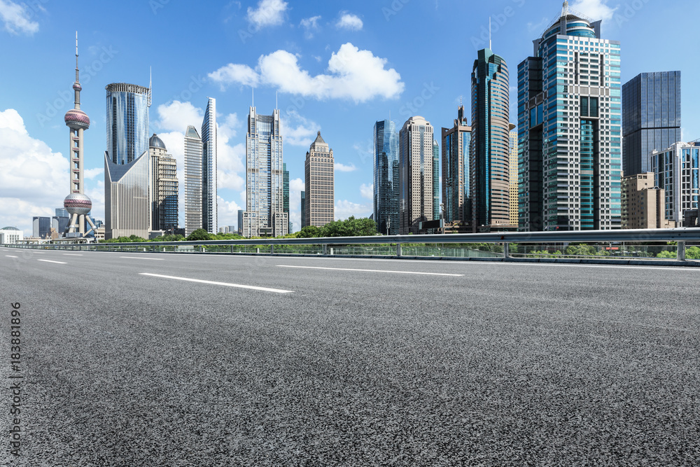 Asphalt highway and modern city commercial buildings in Shanghai,China