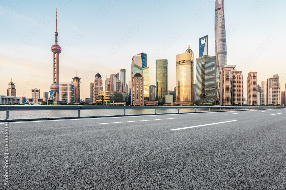 Asphalt highway and modern city commercial buildings in Shanghai,China