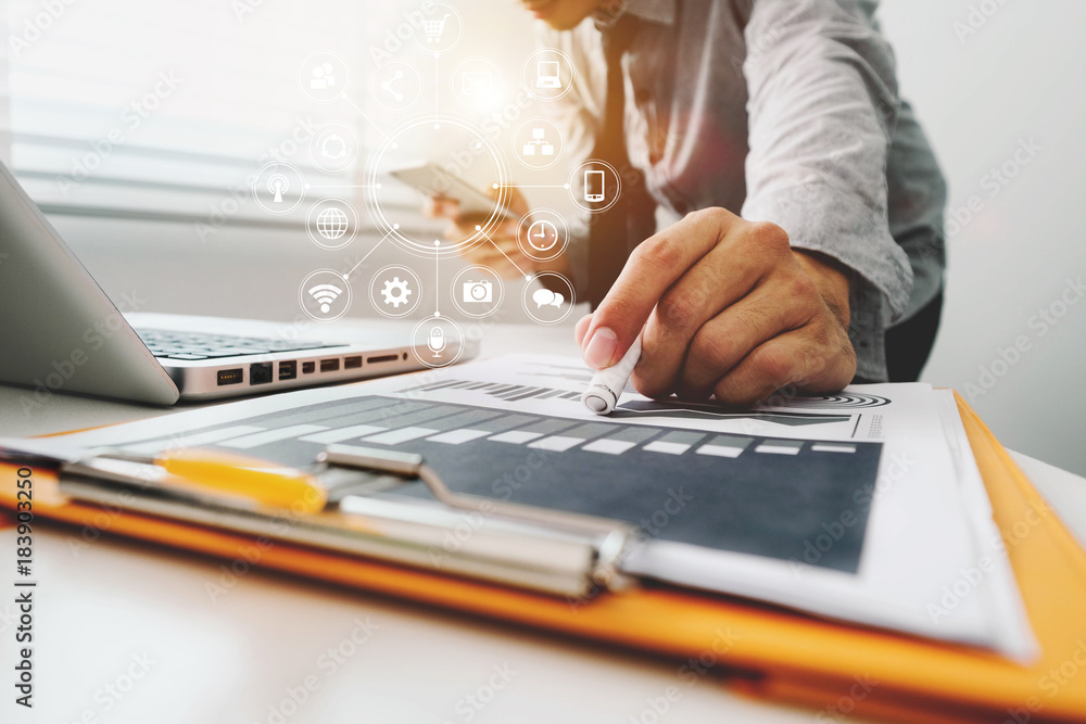 businessman working with digital tablet computer and smart phone with financial business strategy la