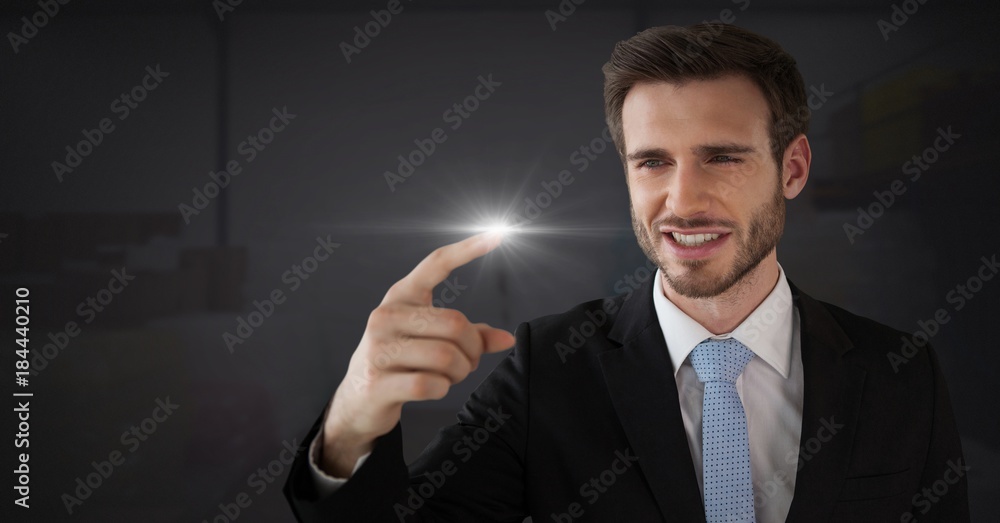 Businessman touching air glow