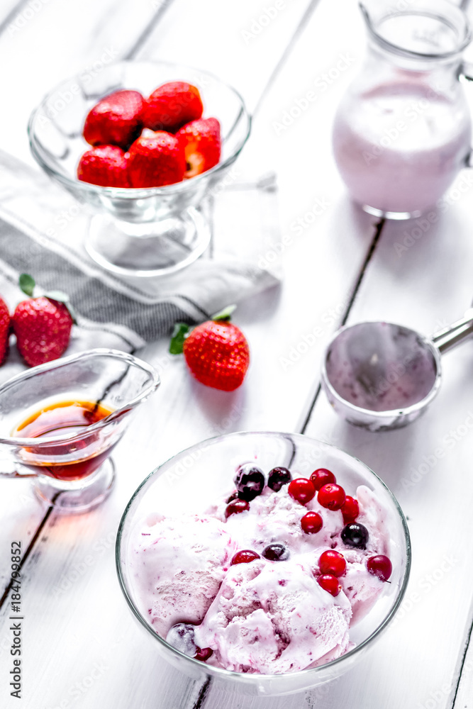 organic homemade ice cream in glass bowl on wooden background