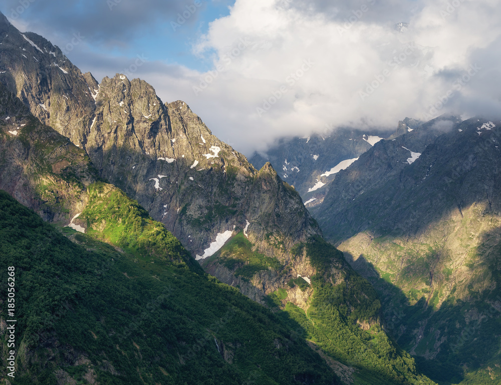 Sunset in the mountain valley. Beautiful natural landscape in the summer time