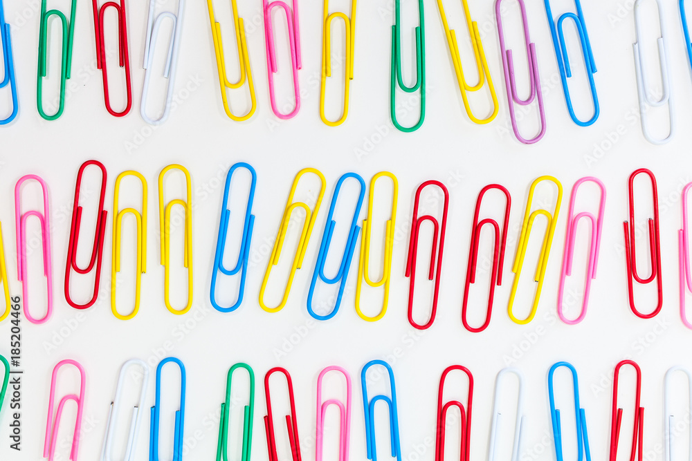 Metal paper clip isolated on a white background