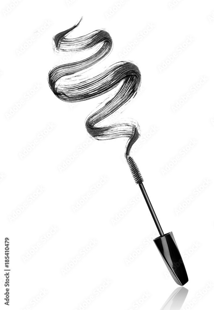 Mascara brush with smear in a spiral shape close-up, isolated on white background