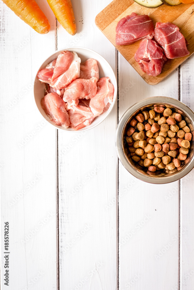 ingredients for pet food holistic top view on wooden background