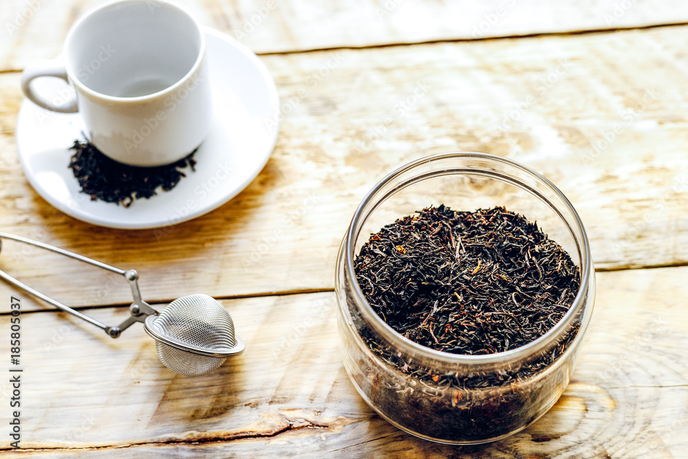 Tea set on the wooden table at sunny morning