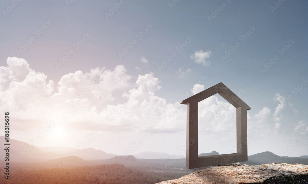 Conceptual image of concrete home sign on hill and natural landscape at background