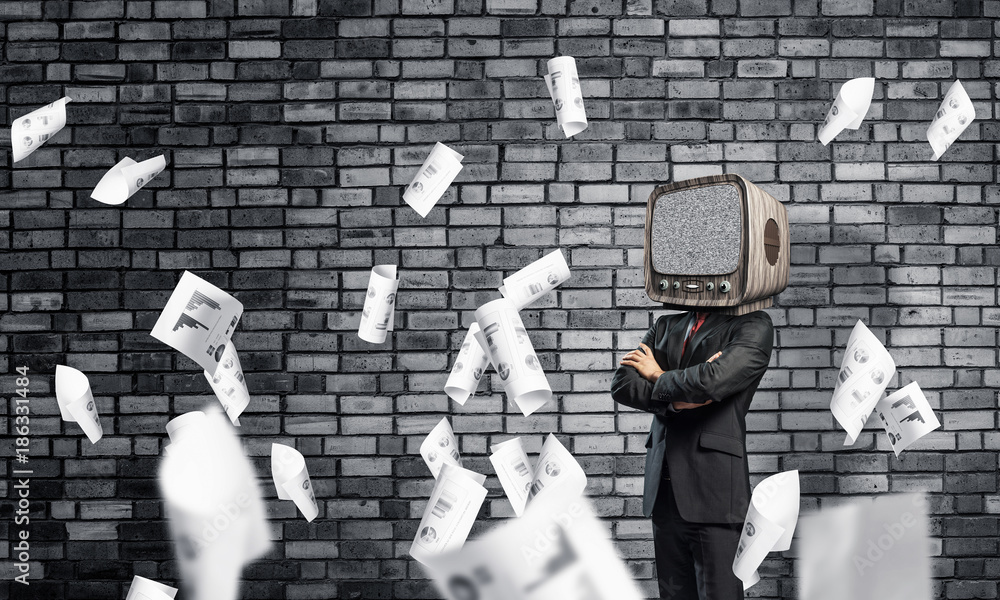 Businessman with old TV instead of head.