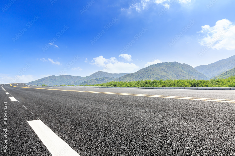 country road and mountains natural landscape in the summer