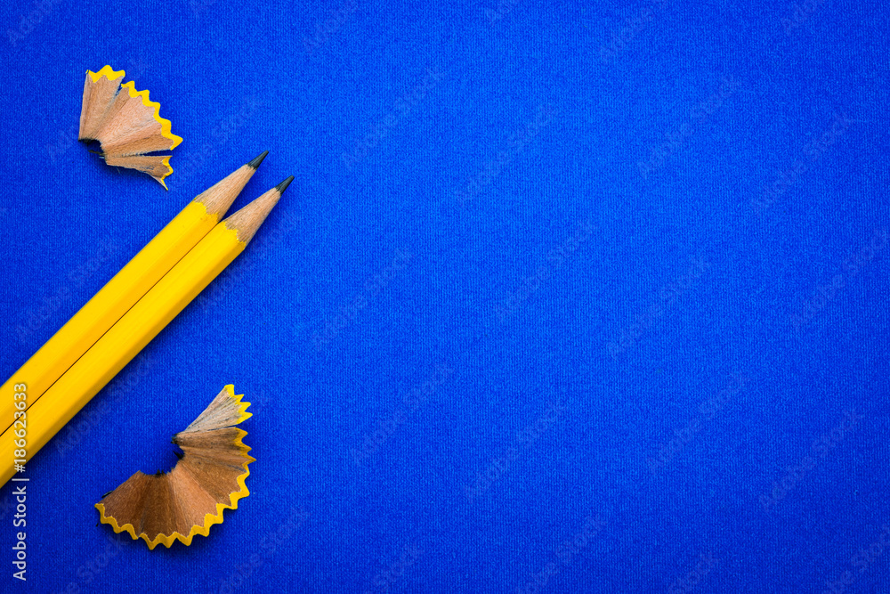 the Yellow pencil on bright blue background ,creative innovation idea symbol or education concept