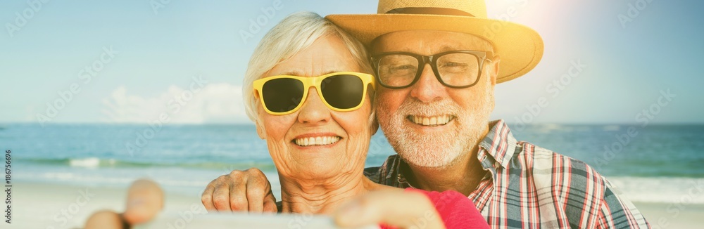 Senior couple taking selfie