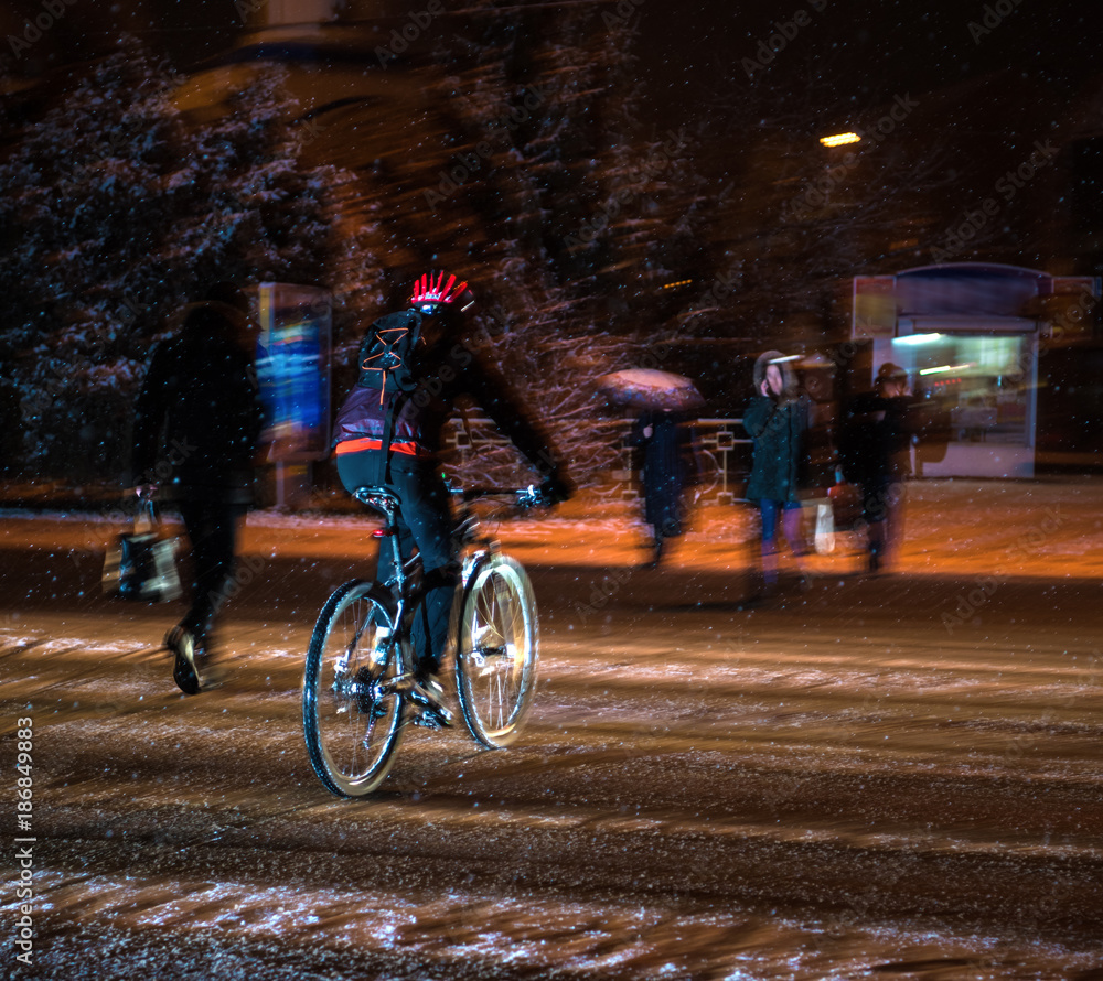 Cyclist on the city roadway in motion blur