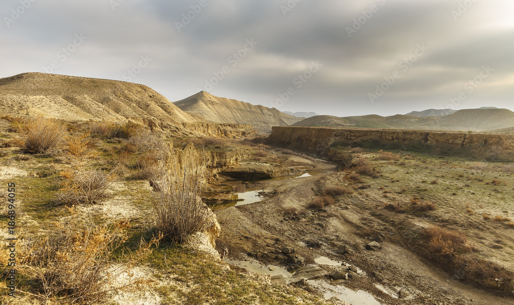 The bed of a dried-up river in the mountains