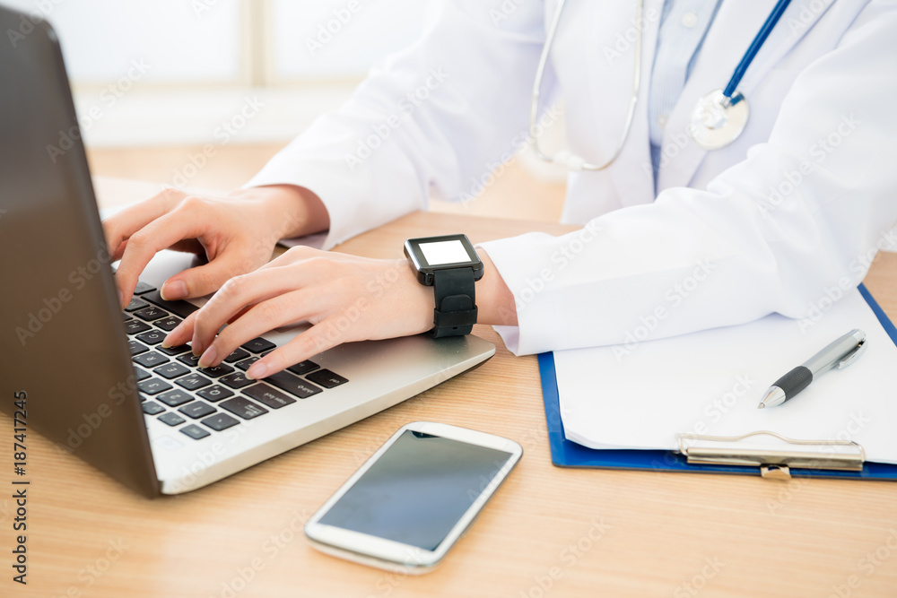 doctor wearing smartwatch with blank screen