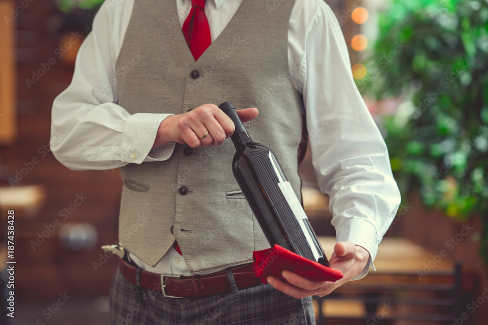 Sommelier with a bottle of wine