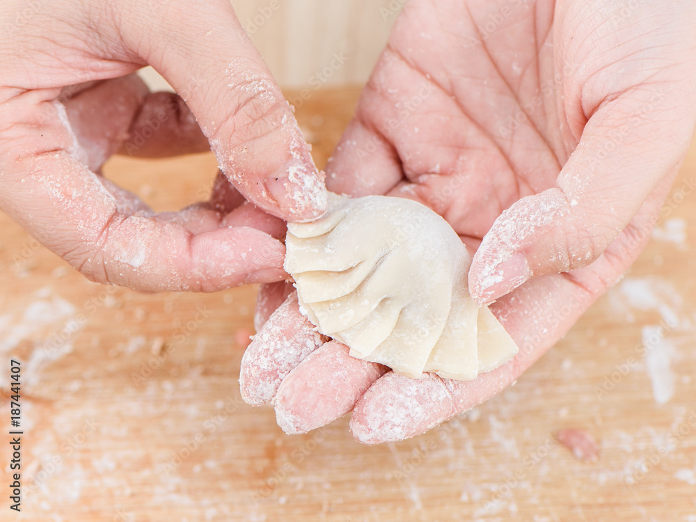 Chef making traditional Chinese dumplings, Chef cooking process
