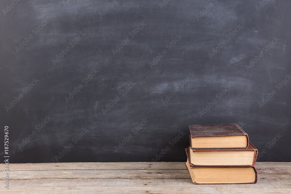 Education and reading concept - group of books on the wooden table