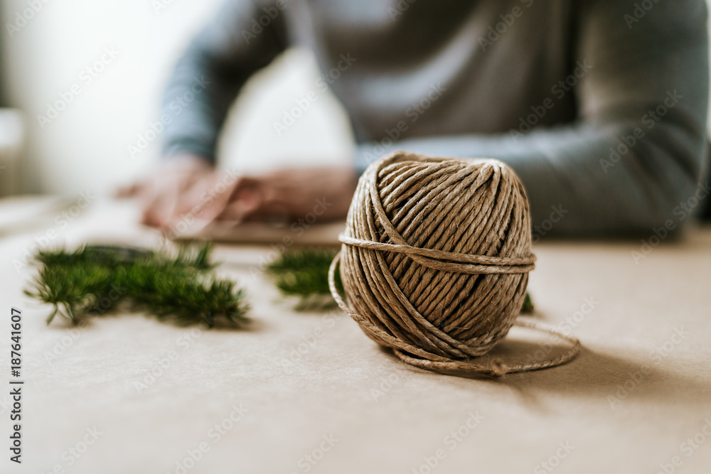 Natural rope and craft paper for packing presents. Wrapping presents.