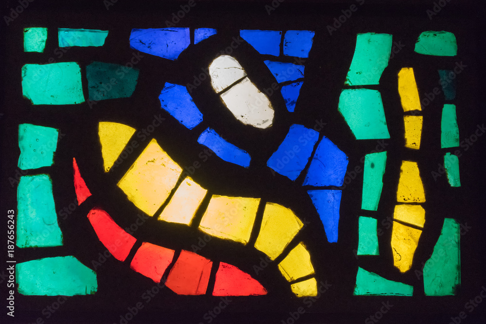 Old multicolored stained glass window.