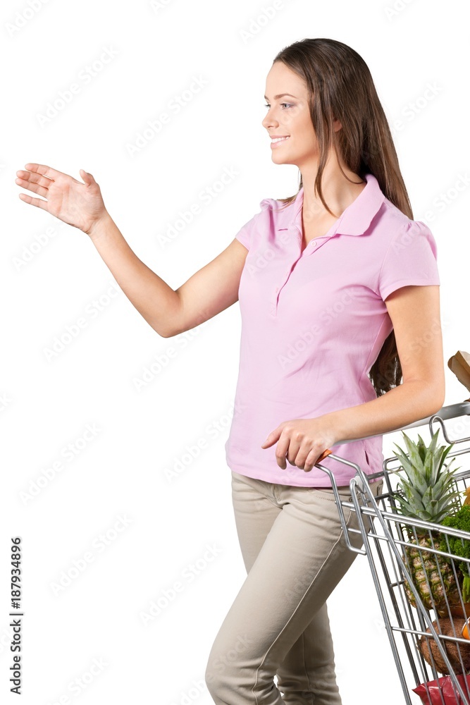 Portrait of a Woman with a Shopping Cart Full of Groceries