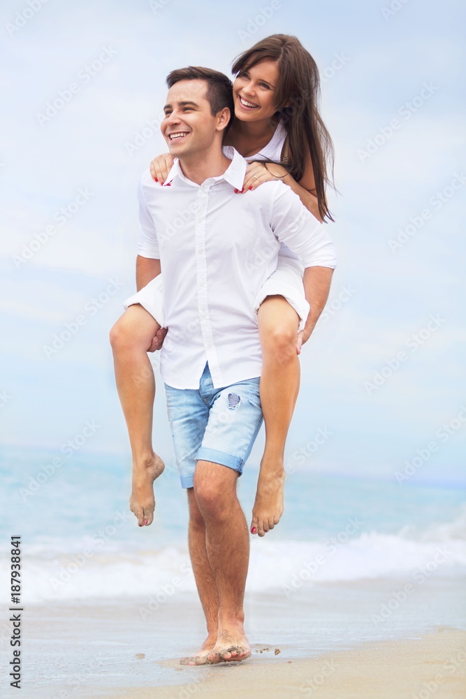 Portrait of a Couple Having Fun at the Beach