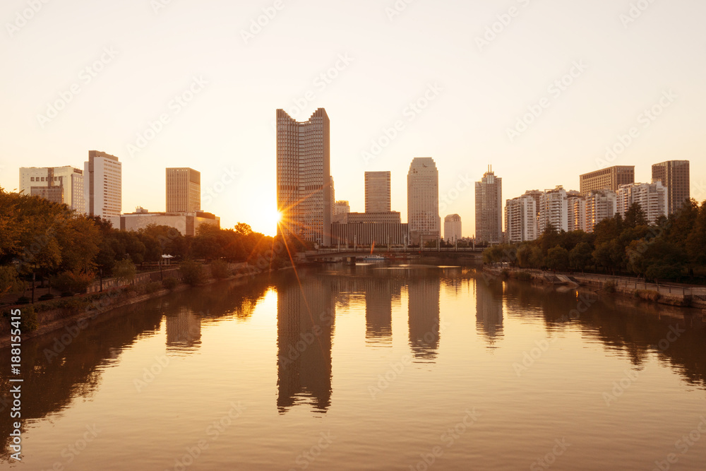 modern buildings near water in modern city