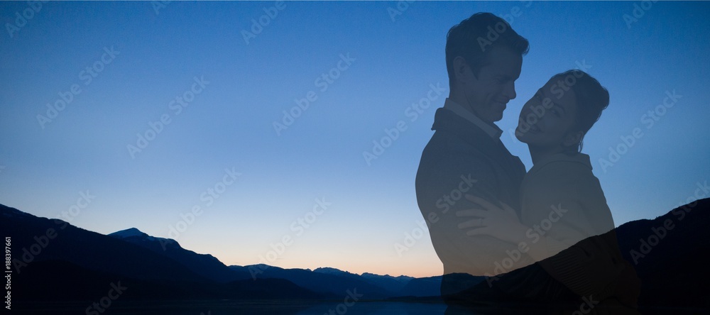 Composite image of full length of romantic couple hugging