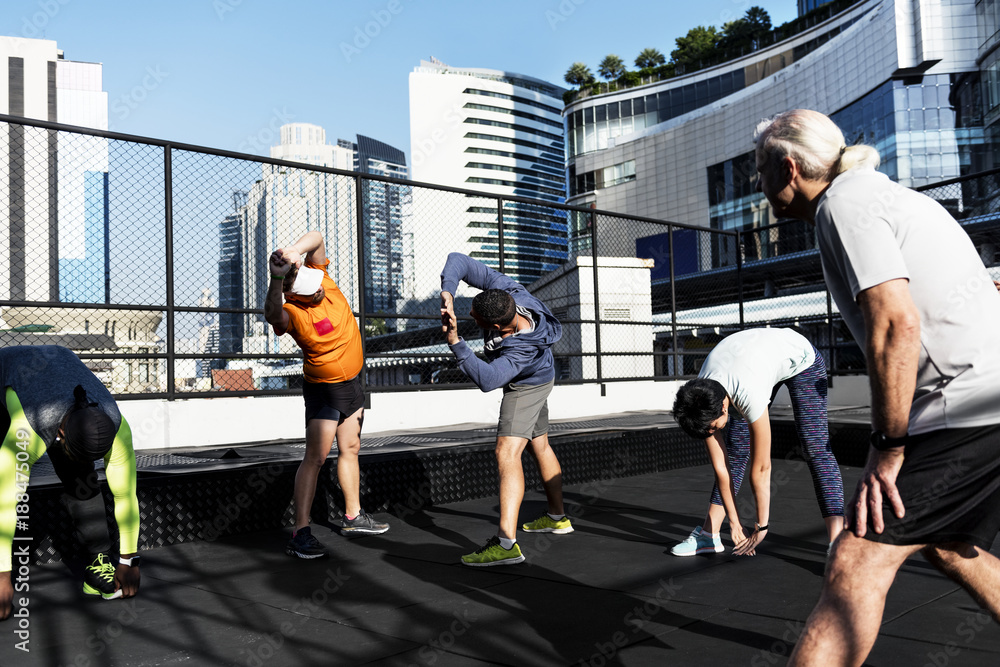 People exercising at fitness gym