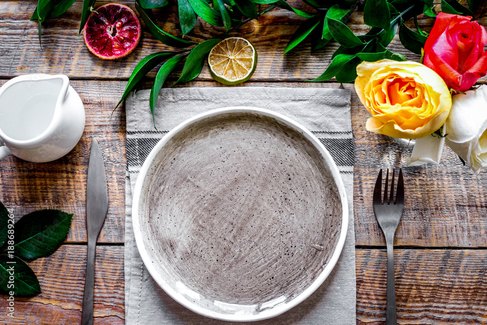 ceramic tableware top view on wooden background mock up