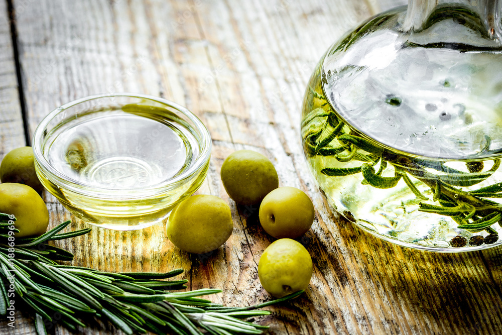 natural oils concept with fresh olives on table background