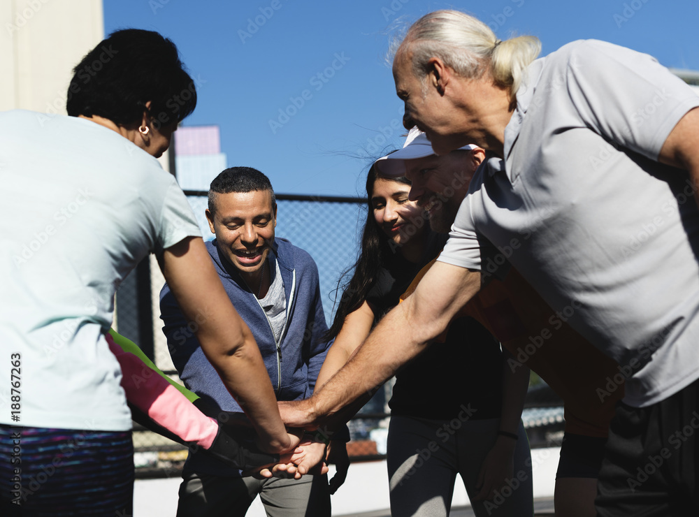 People exercising at fitness gym