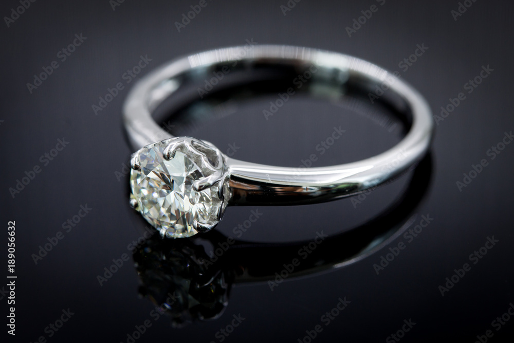 Diamond ring for wedding and engagement on gradient black background