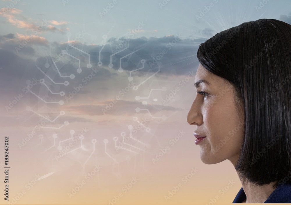 Woman looking at interface in sky